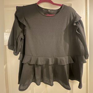 Ann Taylor black, peplum top with puff sleeves and ruffle detail. Size large.